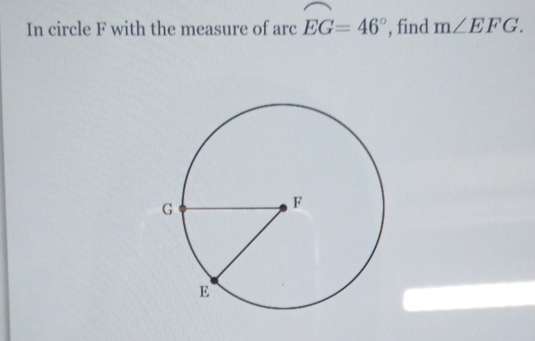 In circle \( \mathrm{F} \) with the measure of arc \( E G=46^{\circ} \), find \( \mathrm{m} \angle E F G \).