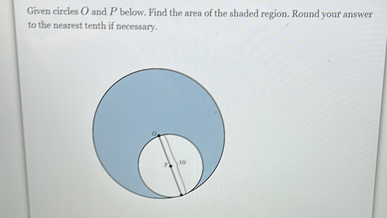 Given circles \( O \) and \( P \) below. Find the area of the shaded region. Round your answer to the nearest tenth if necessary.