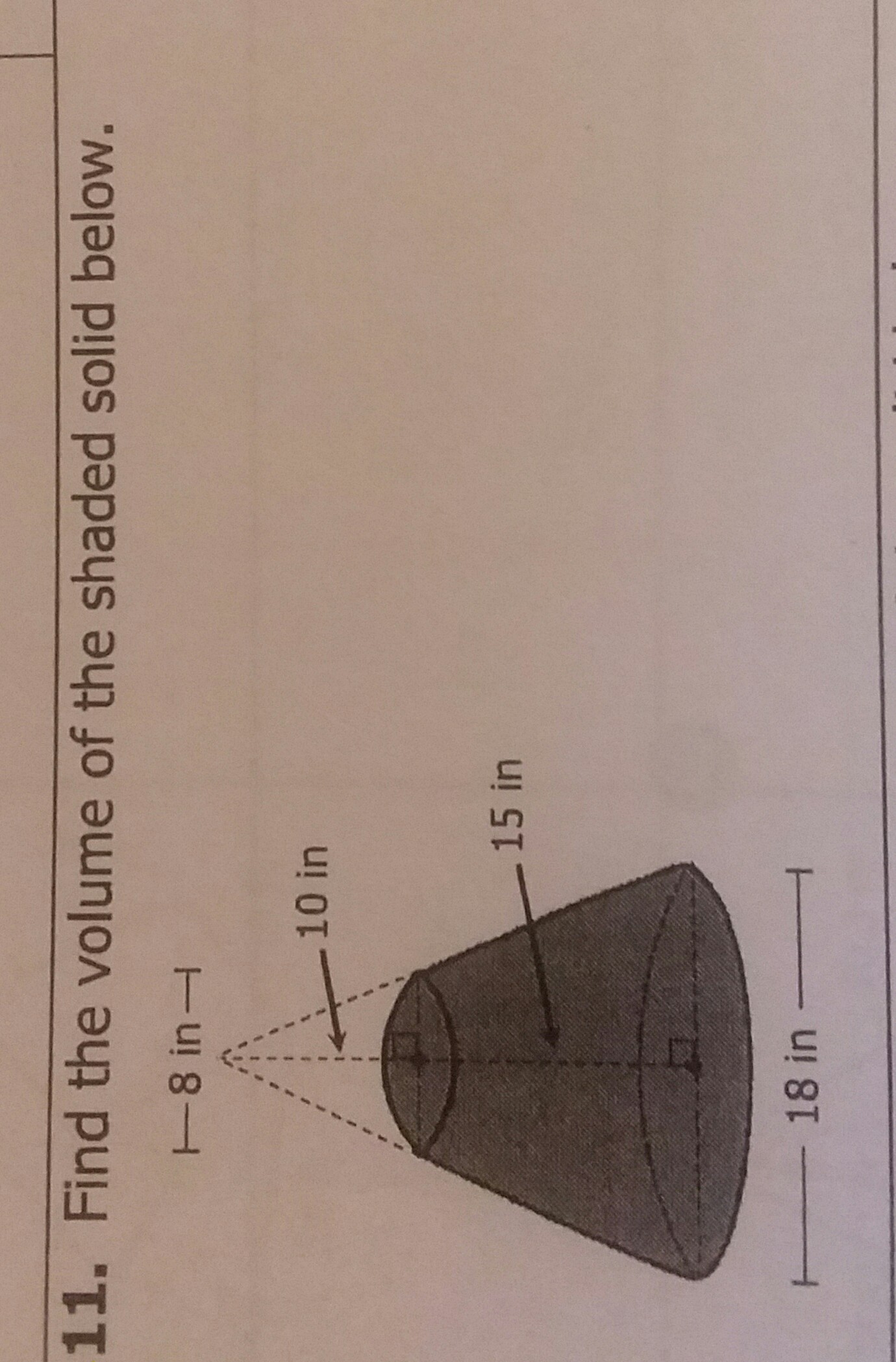 11. Find the volume of the shaded solid below.
\( \longmapsto 18 \) in